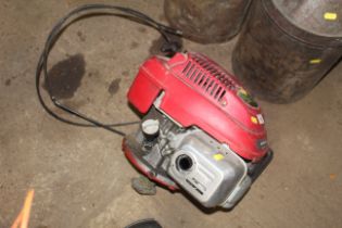 A Honda GCV160 petrol lawnmower engine