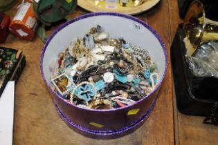 A box of various costume jewellery