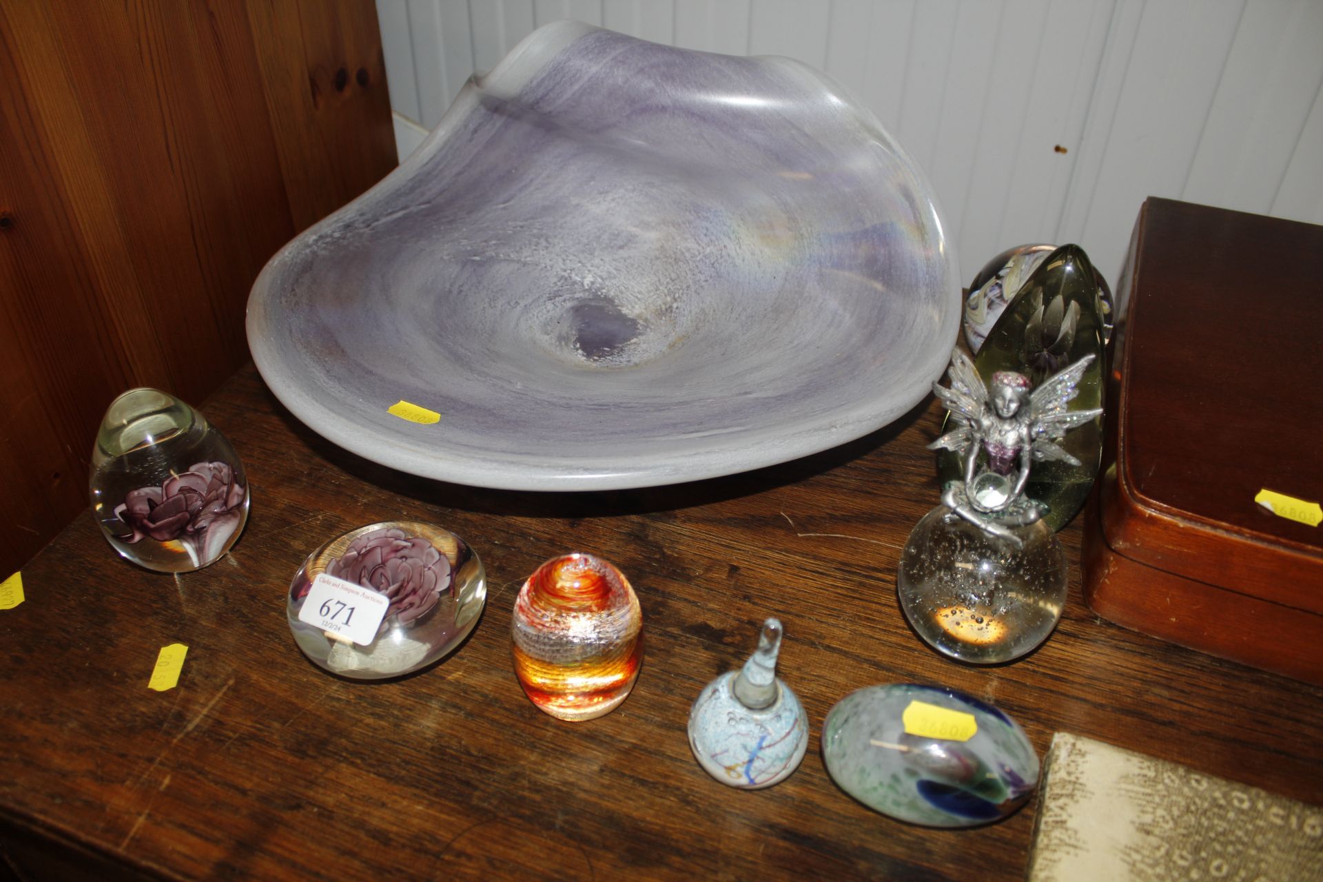 A collection of various coloured glass paperweights, a large Art Glass bowl etc