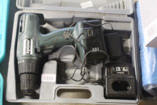 An Agojama cordless electric drill with battery and