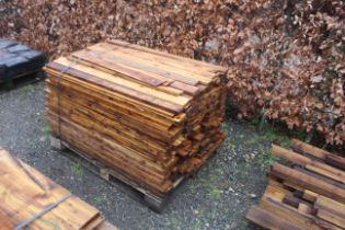 A quantity of various fencing boards and other saw