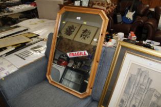 A pine framed wall mirror