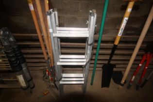 An aluminium four section ladder
