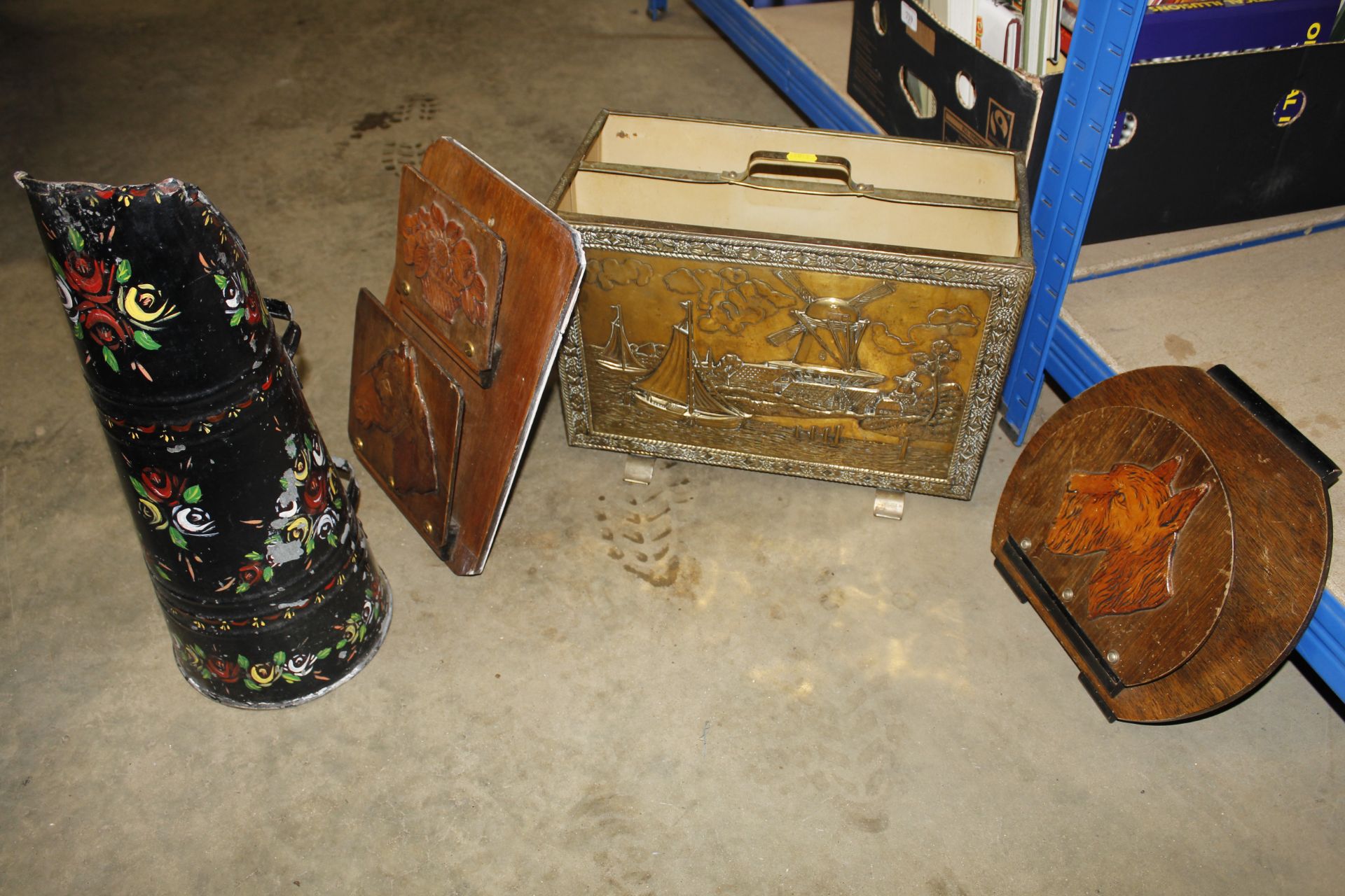 A brass mounted magazine rack, two wooden paper ra