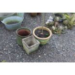 Three various planters and a weeping tree