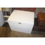 A white painted MDF storage trunk