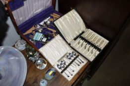 A plated canteen, a cased set of fish knives and folks and a cased set of teaspoons with matching