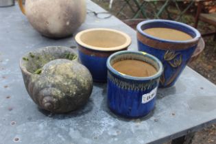 Three blue glazed plant pots and a concrete shell