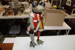 A recycled tin model of a frog