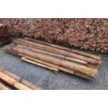 A quantity of various wooden harris fencing boards