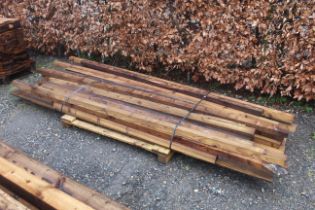 A quantity of various wooden harris fencing boards