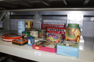 A collection of various advertising tins