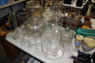 A quantity of various large glass vases, bowls etc