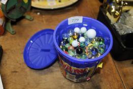 A tub of various marbles
