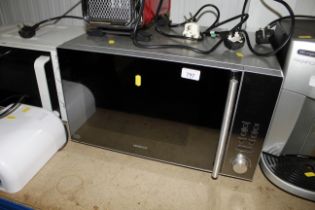 A Kenwood microwave. **This lot is subject to VAT on the hammer price**