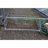 A large and small metal wire rack