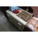 A white painted dresser fitted three drawers