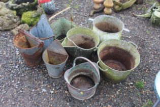 A quantity of metal garden planters