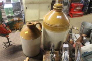 A large stoneware jar and a stoneware flagon