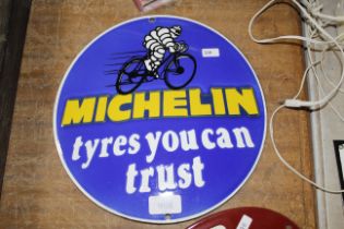 A reproduction Michelin Tyres advertising sign