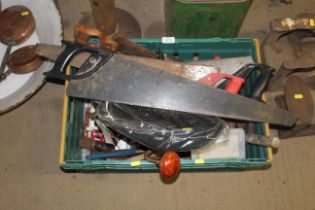 A box containing various tools to include hand saw