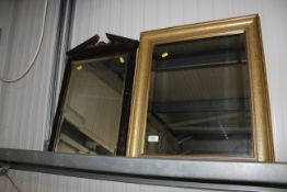 A gilt framed wall mirror and an Edwardian dressin