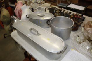 An aluminium fish kettle; a large saucepan and a b