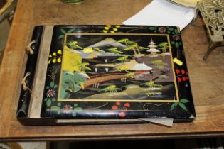 A Japanese lacquered album with musical movement