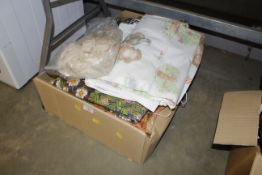 A box of various textiles
