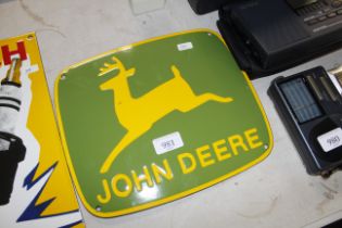 A reproduction John Deere advertising sign