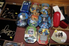 A collection of Pokémon cards and Dr Who items