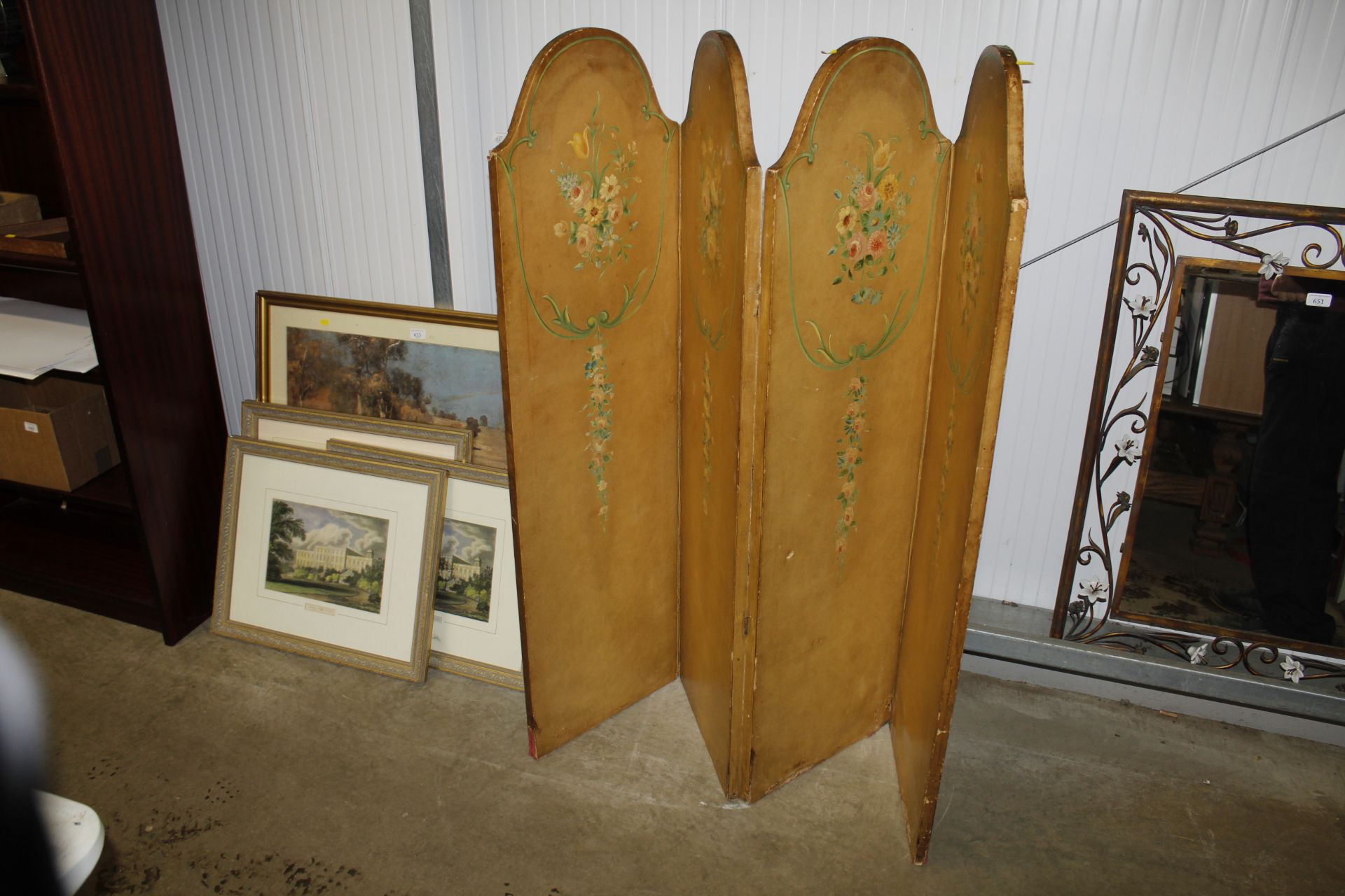 A decorated leather four fold boudoir screen