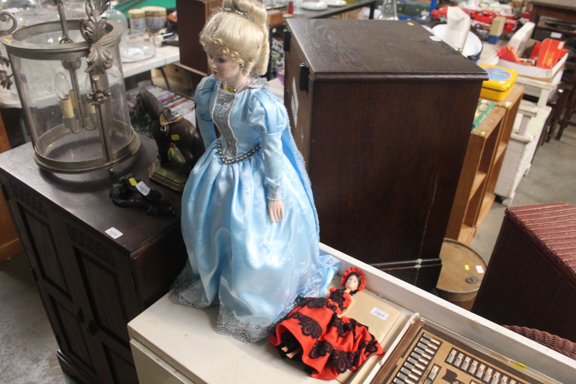 A souvenirs doll and a collectors doll of "Cinderella"
