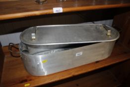 An aluminium fish kettle