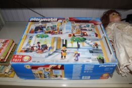 A box of assorted PlayMobil