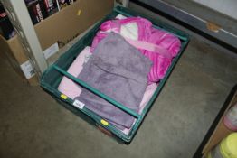 A box containing blankets and towels