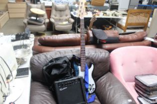 A Jaxsville base guitar and Rockburn amplifier