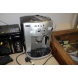 A DeLonghi Magnifica bean to cup coffee machine. **This lot is subject to VAT on the hammer price**