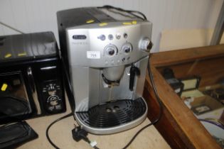 A DeLonghi Magnifica bean to cup coffee machine. **This lot is subject to VAT on the hammer price**