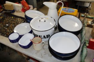 A collection of various enamel kitchenware