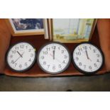 Three Westclox electric wall clocks