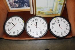 Three Westclox electric wall clocks