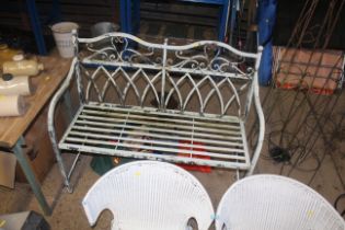 A lightweight metal folding garden bench