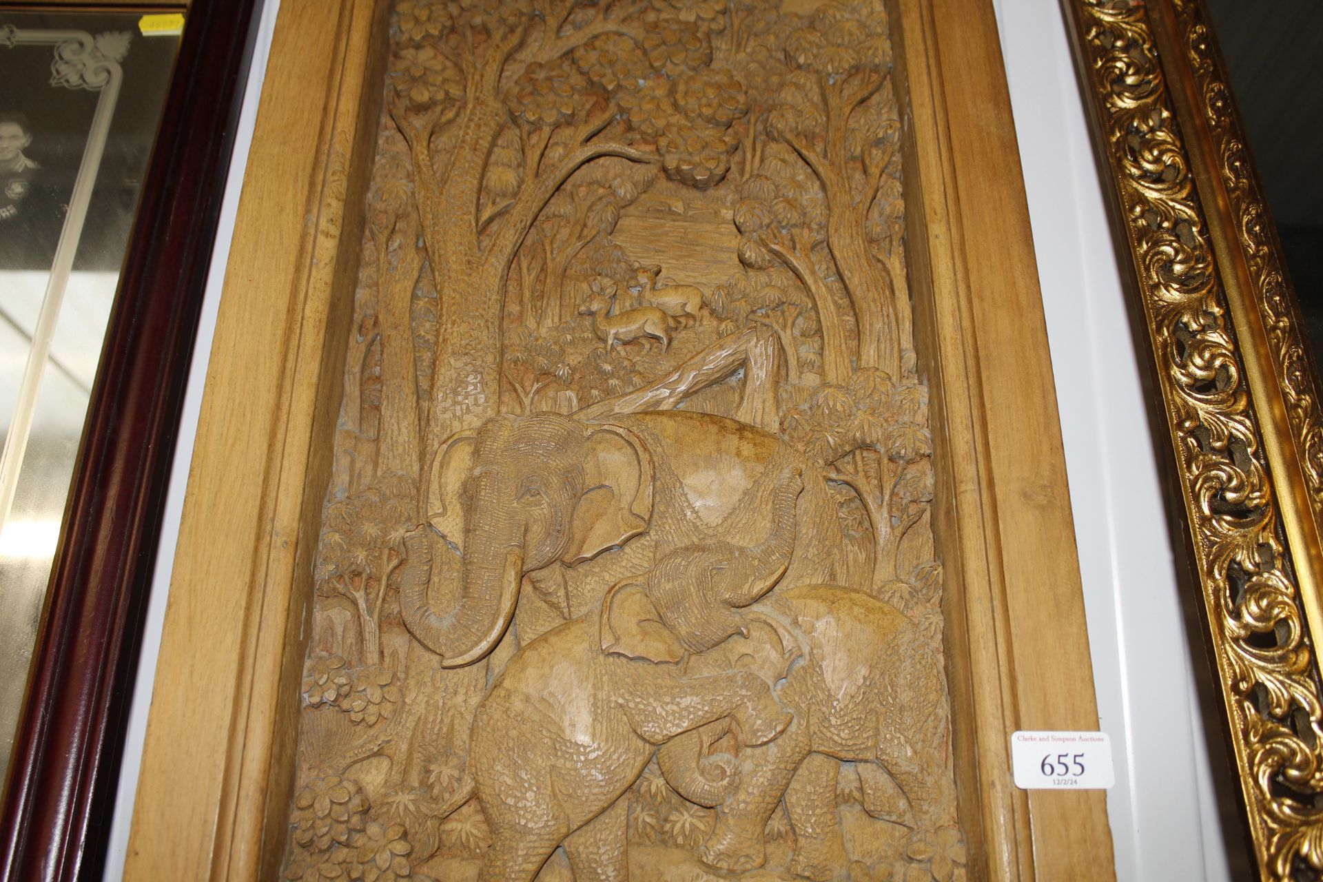 A carved hardwood relief plaque depicting elephant - Image 2 of 2