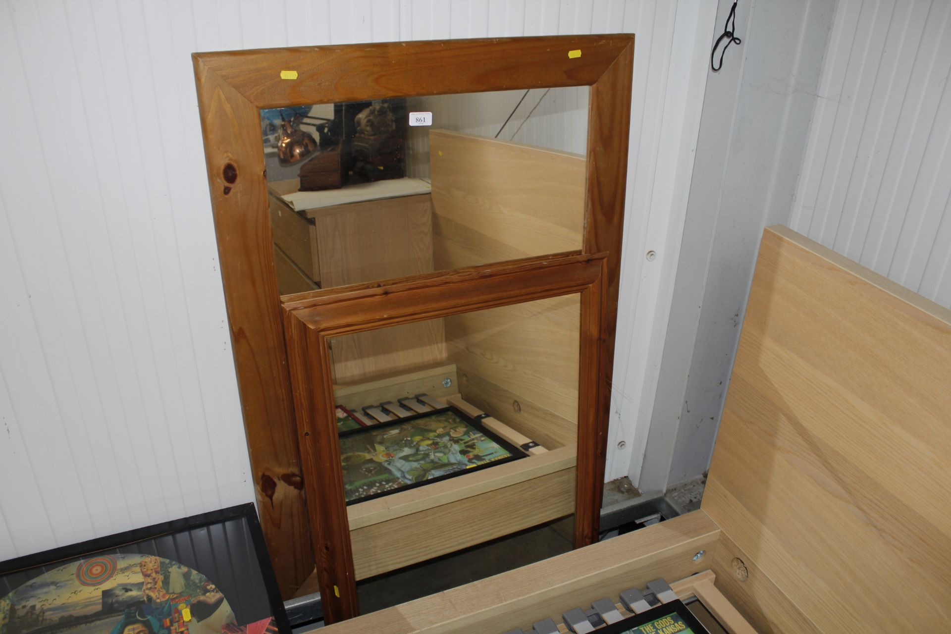 Two pine framed wall mirrors