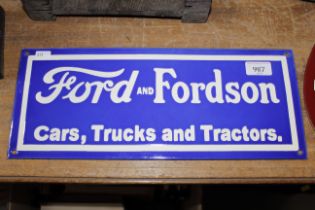 A reproduction Ford and Fordson advertising sign