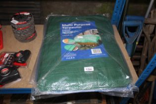 Four various sized tarpaulins (60)