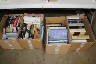 Four boxes of miscellaneous hard back books