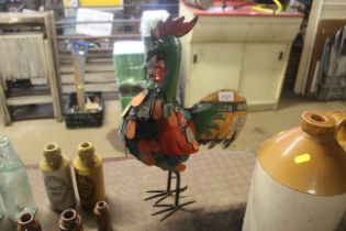 A recycled tin model in the form of a cockerel (13