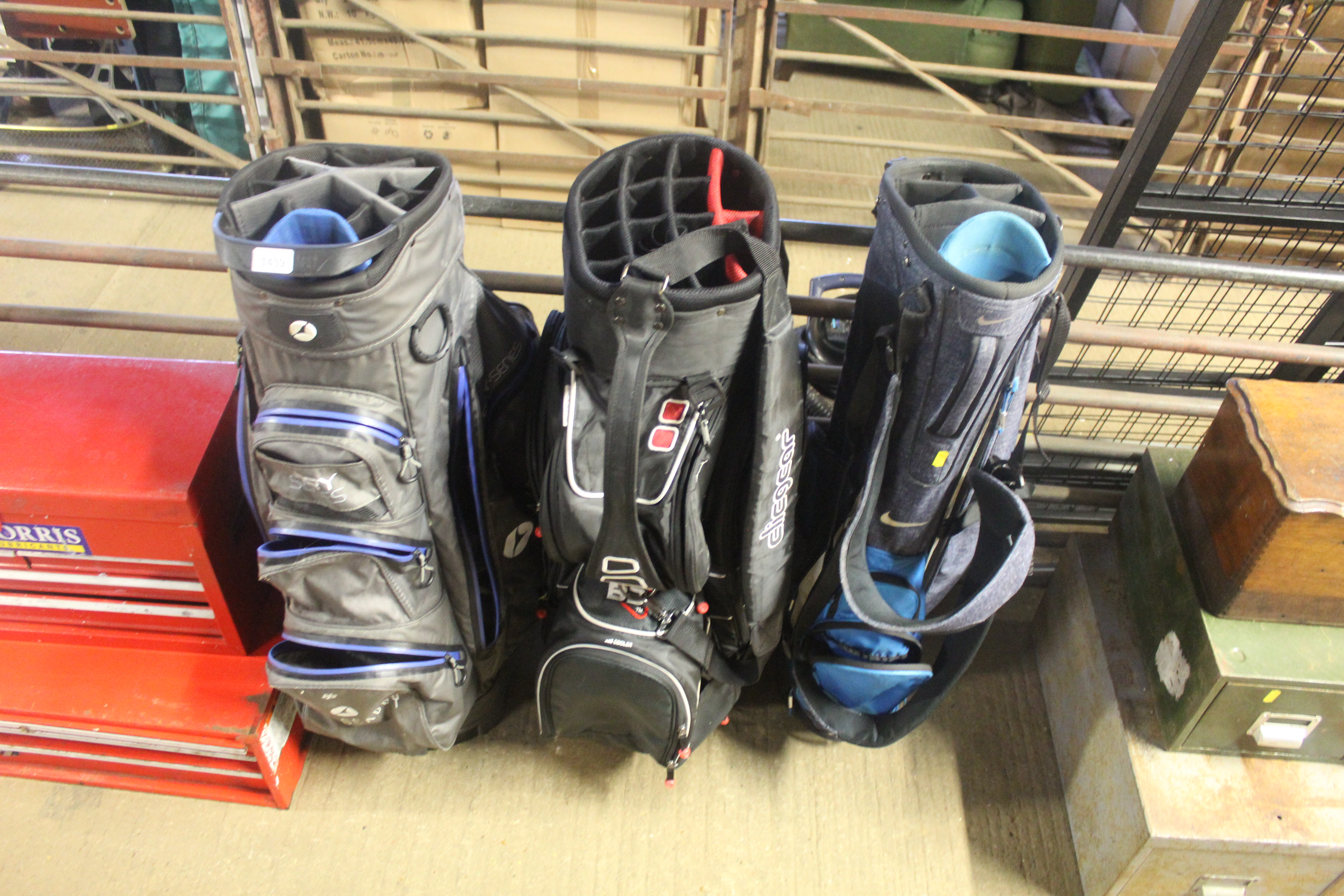 A Motocaddy dry series golf bag; a Clicgear golf b